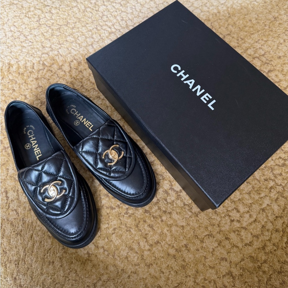 CHANEL Black Loafers with Gold Logo